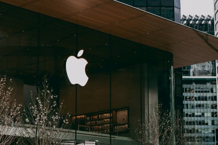 modern glass facade of apple store building