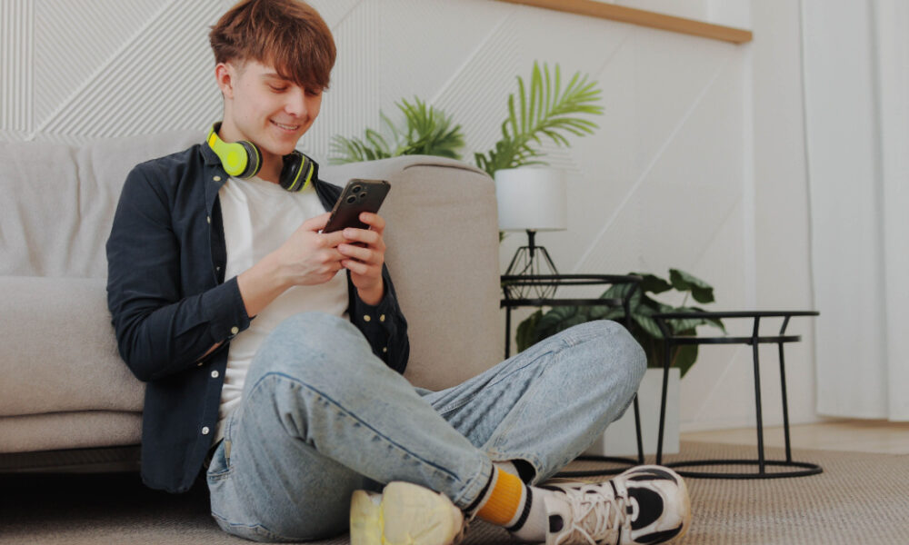 Boy gaming on phone